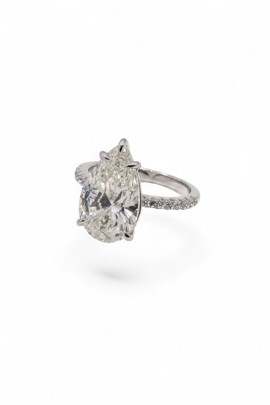 The Solitaire Muse — Pear-Cut Diamond Engagement Ring with Pavé Band