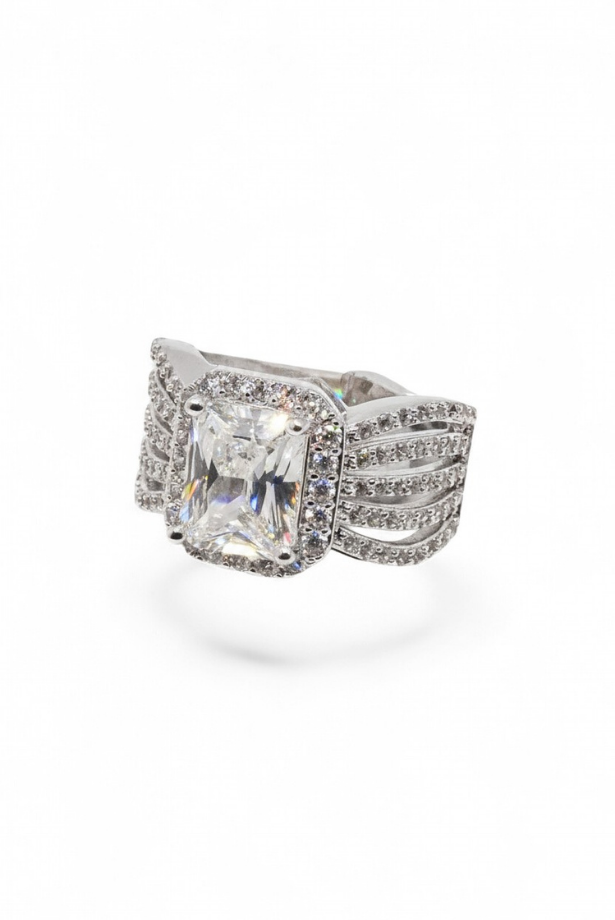 The Wingspan Halo — Emerald-Cut Diamond Ring with Sculptural Multi-Row Shoulders
