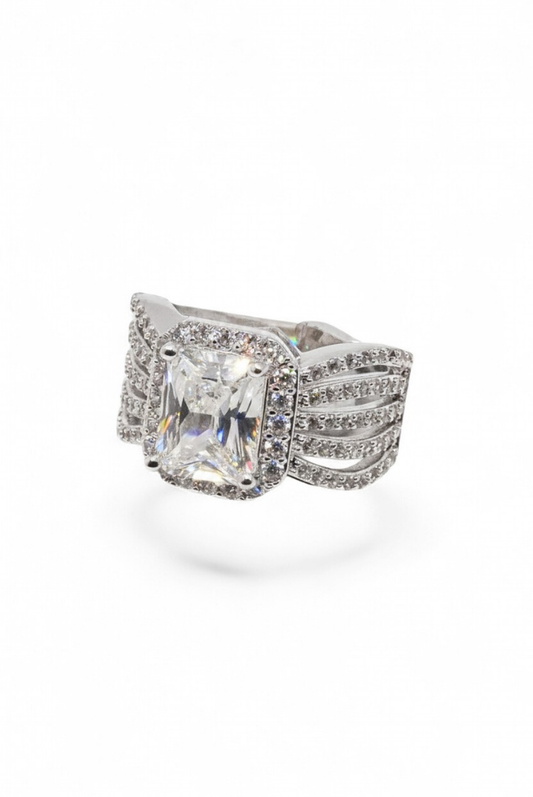 The Wingspan Halo — Emerald-Cut Diamond Ring with Sculptural Multi-Row Shoulders