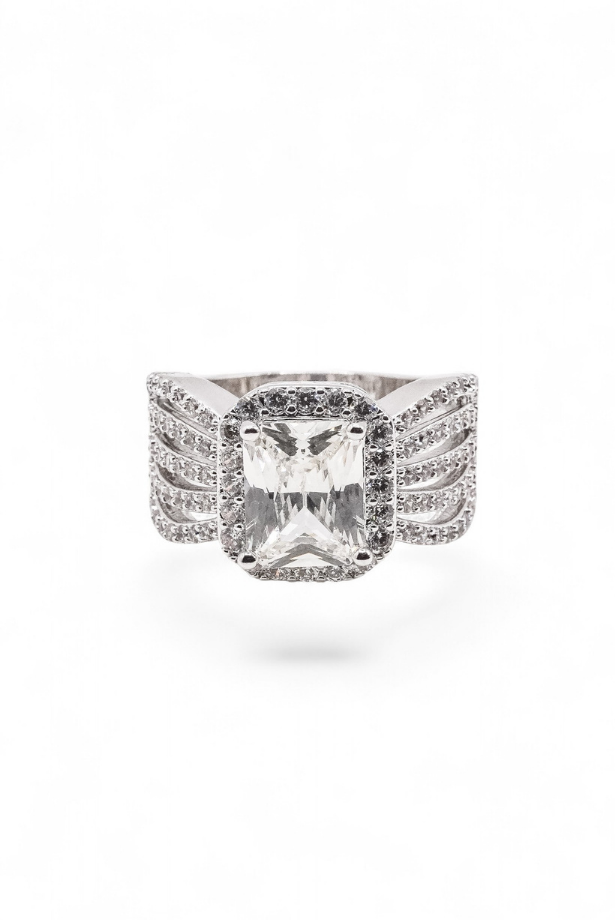 The Wingspan Halo — Emerald-Cut Diamond Ring with Sculptural Multi-Row Shoulders