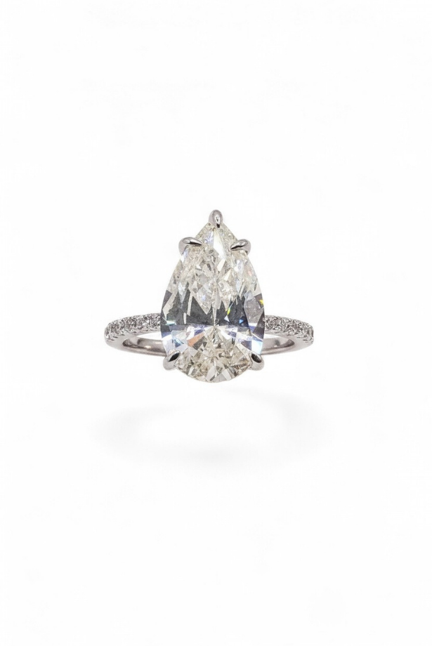 The Solitaire Muse — Pear-Cut Diamond Engagement Ring with Pavé Band