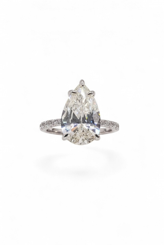 The Solitaire Muse — Pear-Cut Diamond Engagement Ring with Pavé Band