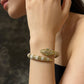 Serpenti Gold Emerald Eye Snake Wrap Bangle