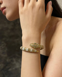 Serpenti Gold Emerald Eye Snake Wrap Bangle